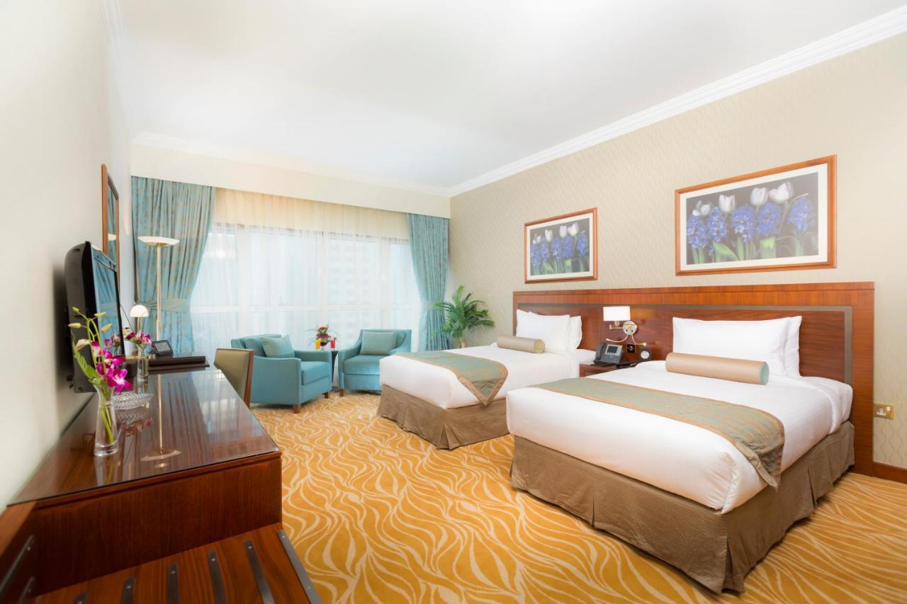 Grand Mercure Majlis Residences Abu Dhabi Bagian luar foto Deluxe Room